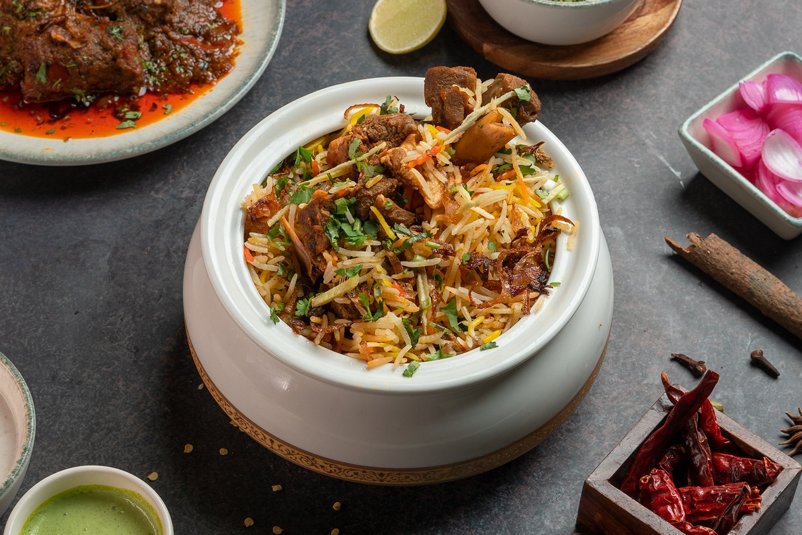 Mutton Dum Biryani + Raita + Drink